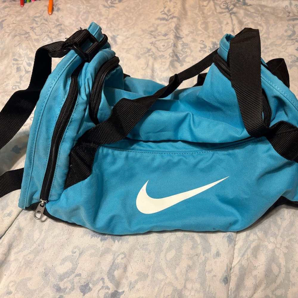 Nike Teal Duffel Bag with Black Accents